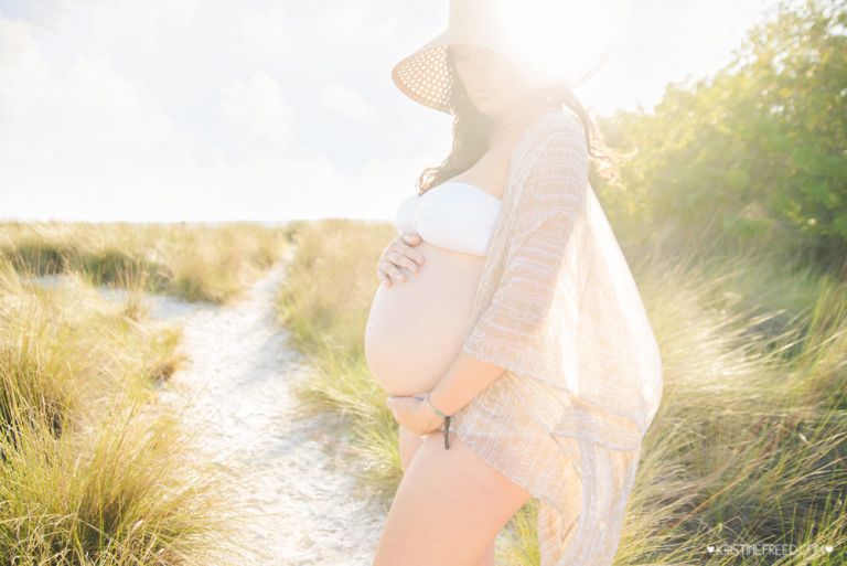 gorgeous pregnant beach mama in sun hat and kimono in Tampa FL, Kristine Freed Photography