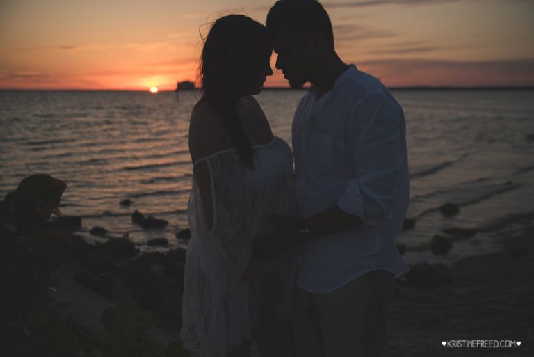 beach maternity pictures taken at sunset at Cypress Point Park in Tampa FL, Kristine Freed Photography
