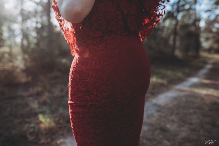 pregnant belly with small sunflare