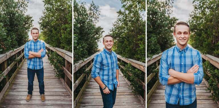 senior boy on wooden bridge