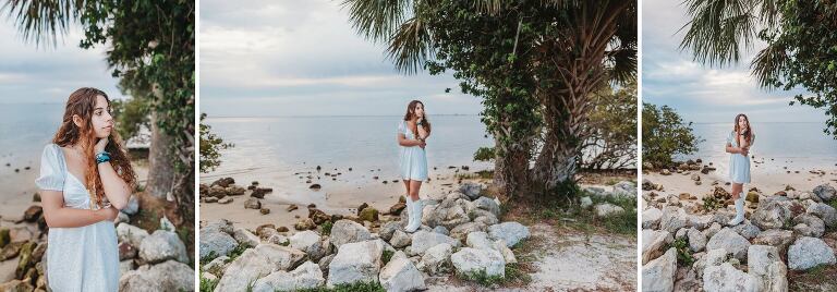 senior girl on rocks by water